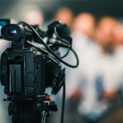 Camera at media conference